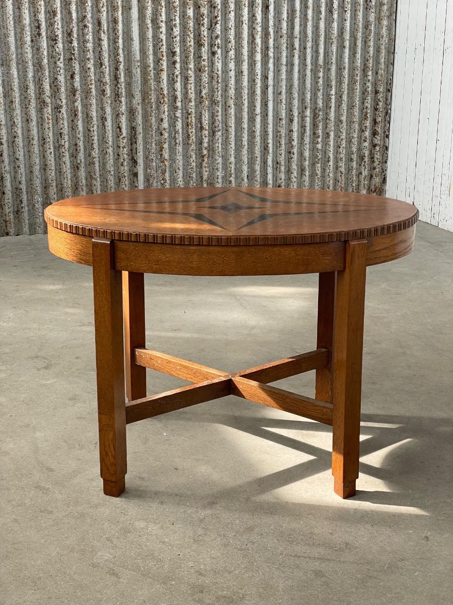 Oval shape ‘Amsterdamse school’ side table in oak and ebony 1930s