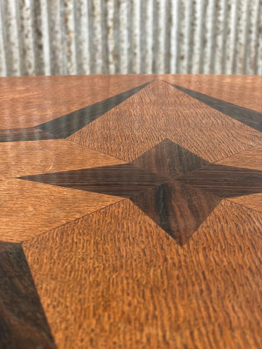 Oval shape ‘Amsterdamse school’ side table in oak and ebony 1930s