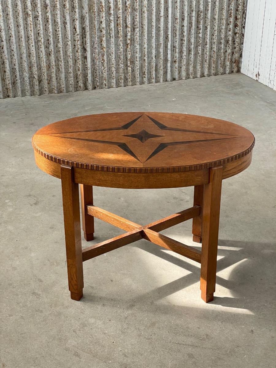 Oval shape ‘Amsterdamse school’ side table in oak and ebony 1930s