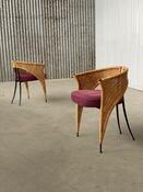 Pair of postmodern Italian wicker design dining chairs 1980s