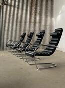 Vintage rare design lounge chairs 1970s tubular frame and black leather 
