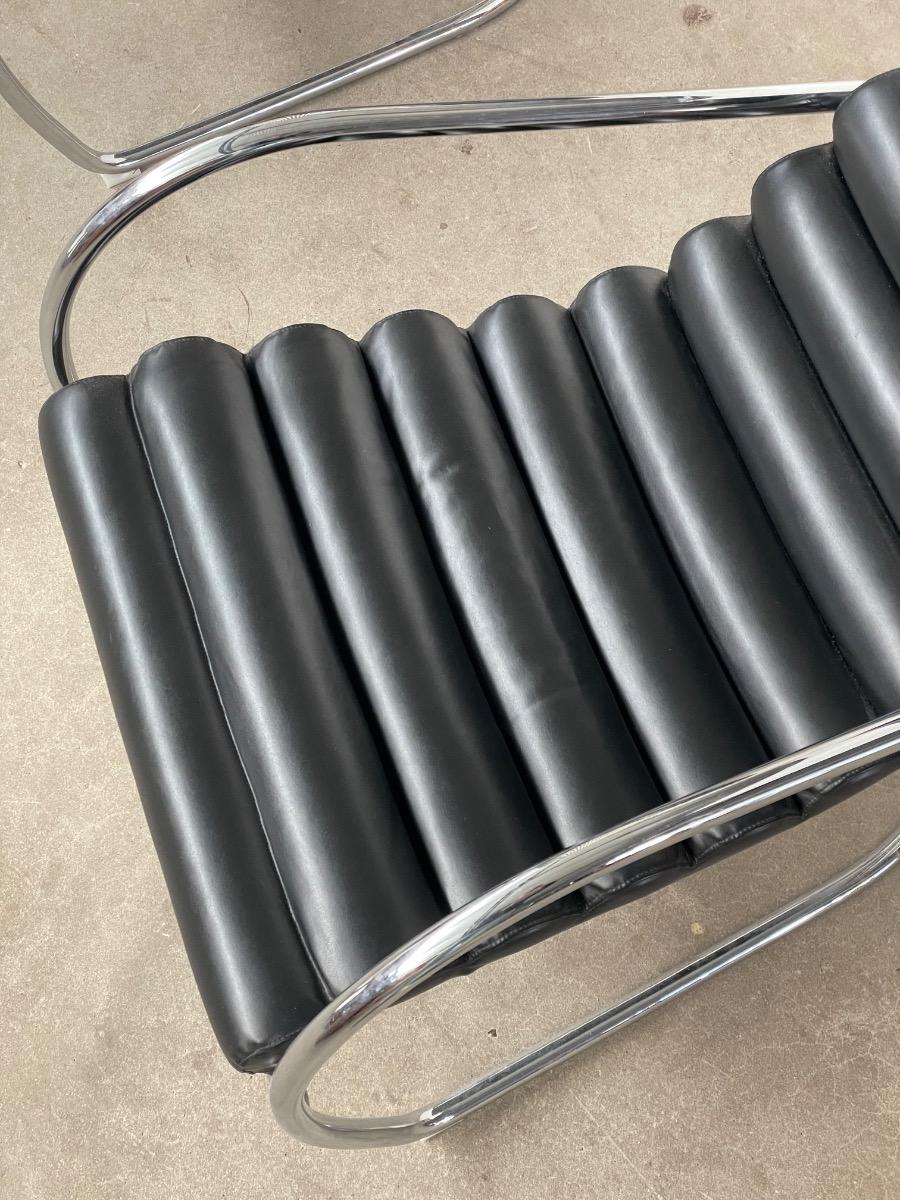 Vintage rare design lounge chairs 1970s tubular frame and black leather 