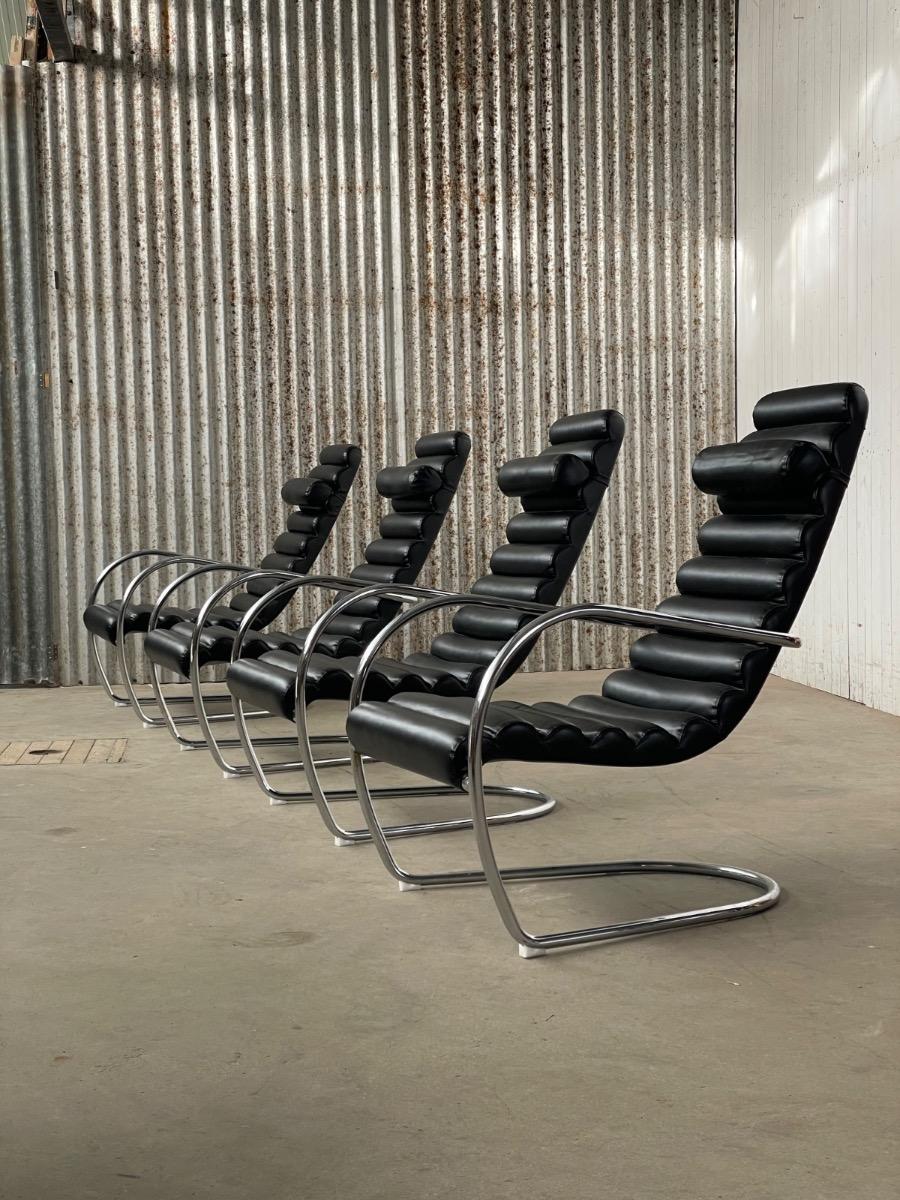 Vintage rare design lounge chairs 1990s tubular frame and black leather
