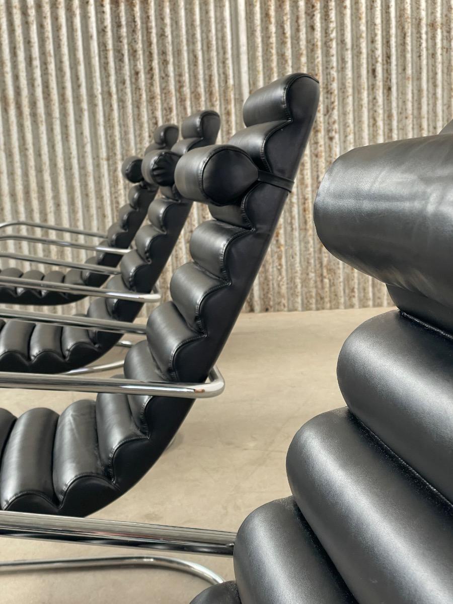 Vintage rare design lounge chairs 1990s tubular frame and black leather