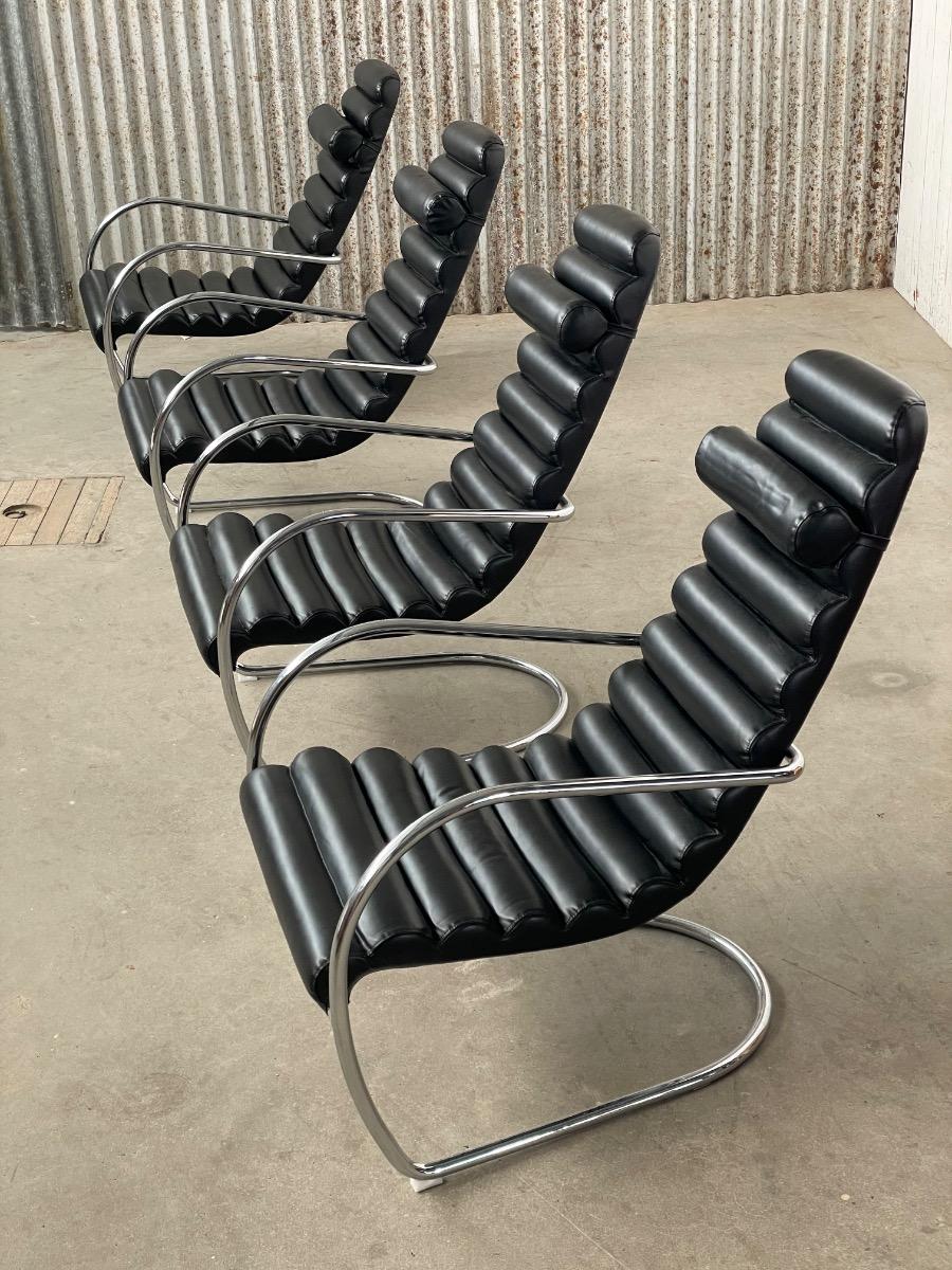 Vintage rare design lounge chairs 1990s tubular frame and black leather