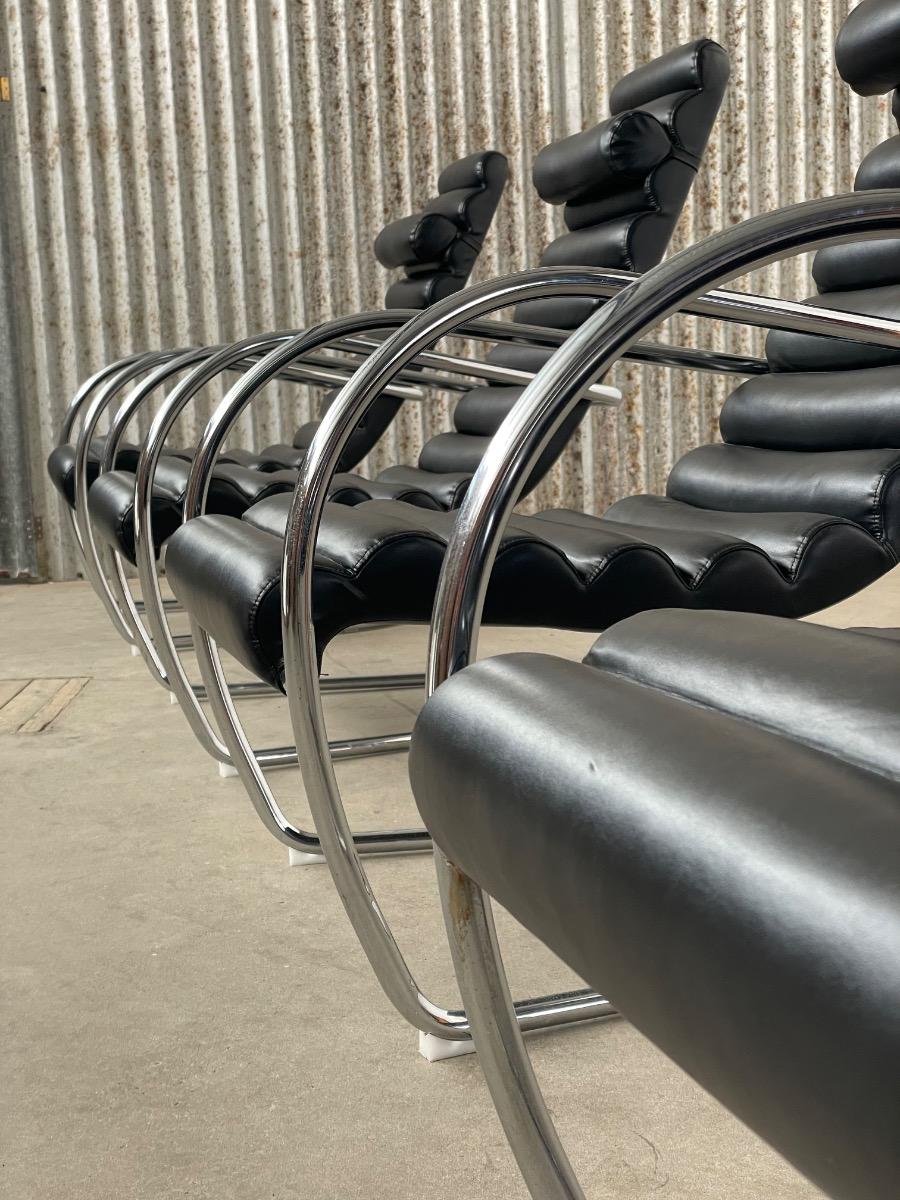 Vintage rare design lounge chairs 1990s tubular frame and black leather