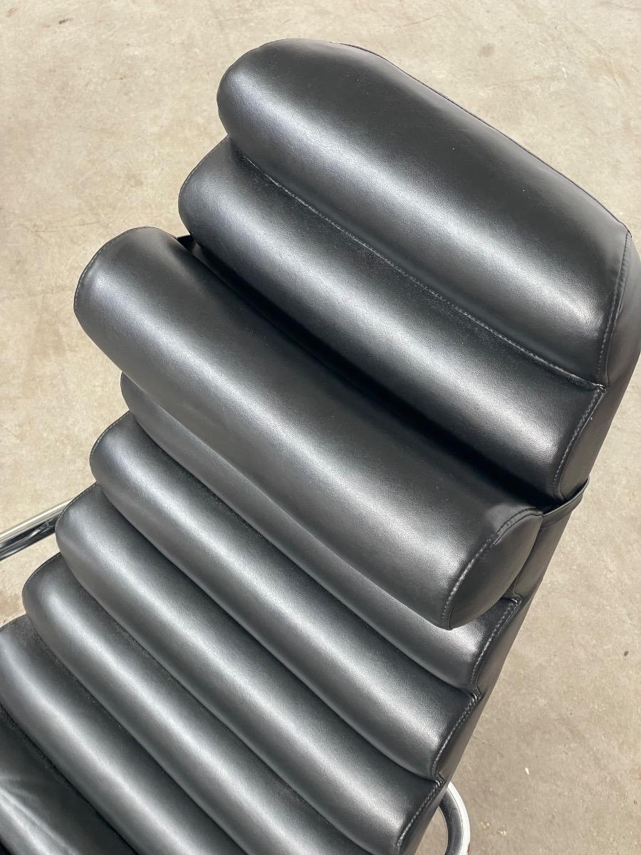 Vintage rare design lounge chairs 1990s tubular frame and black leather