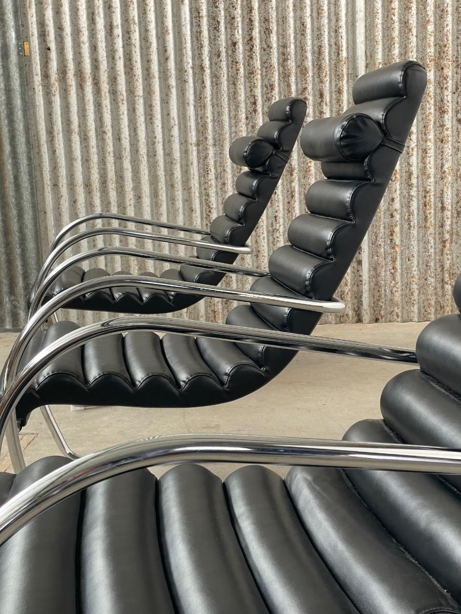 Vintage rare design lounge chairs 1990s tubular frame and black leather