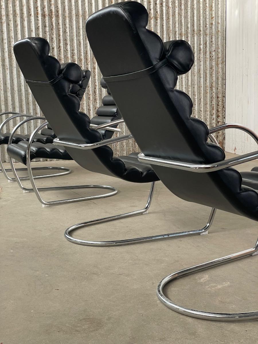 Vintage rare design lounge chairs 1990s tubular frame and black leather
