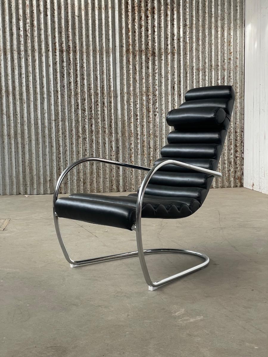 Vintage rare design lounge chairs 1990s tubular frame and black leather
