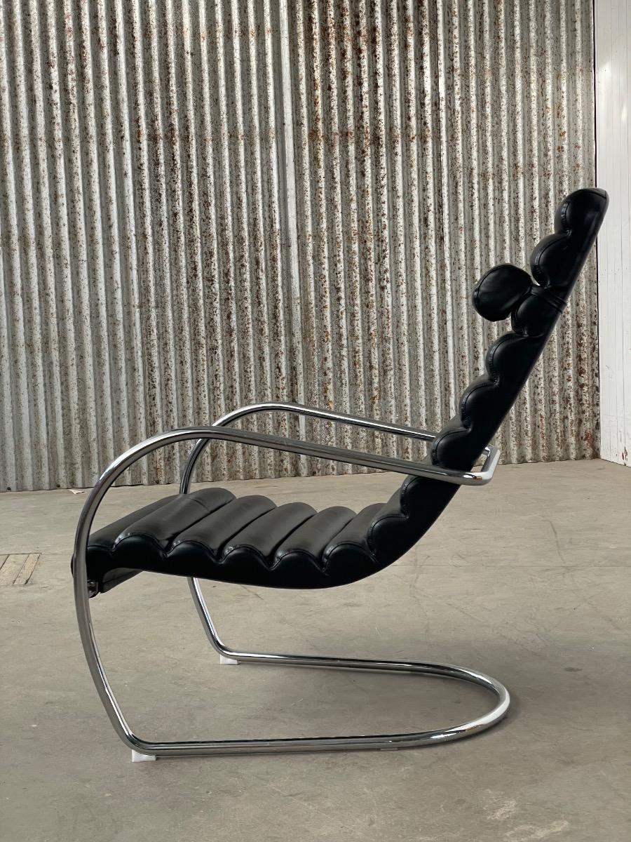 Vintage rare design lounge chairs 1990s tubular frame and black leather