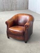 Vintage sheep leather armchair by Joris in cognac 