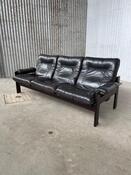 Vintage sofa black thick leather, design 1960s